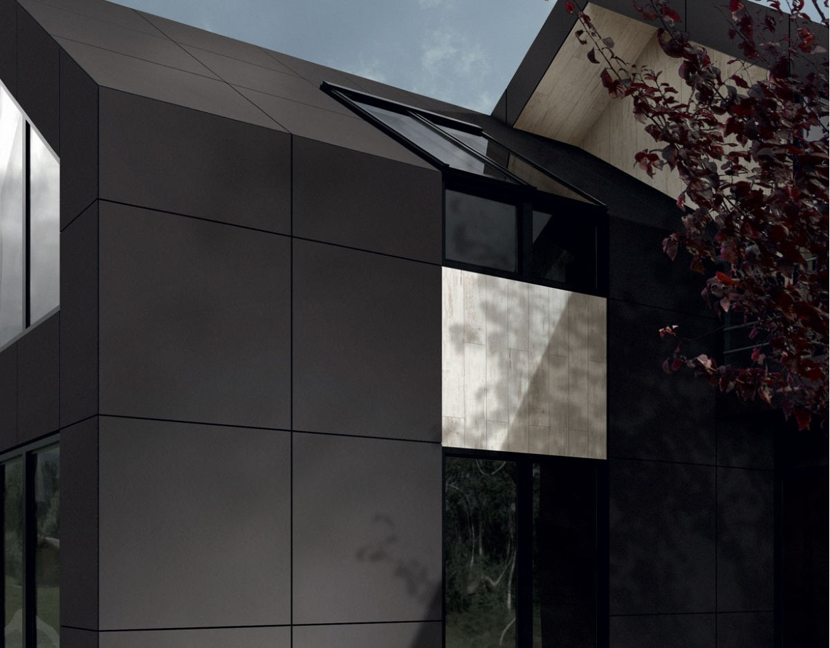 Residential building with coordinated porcelain facade and ceramic roof