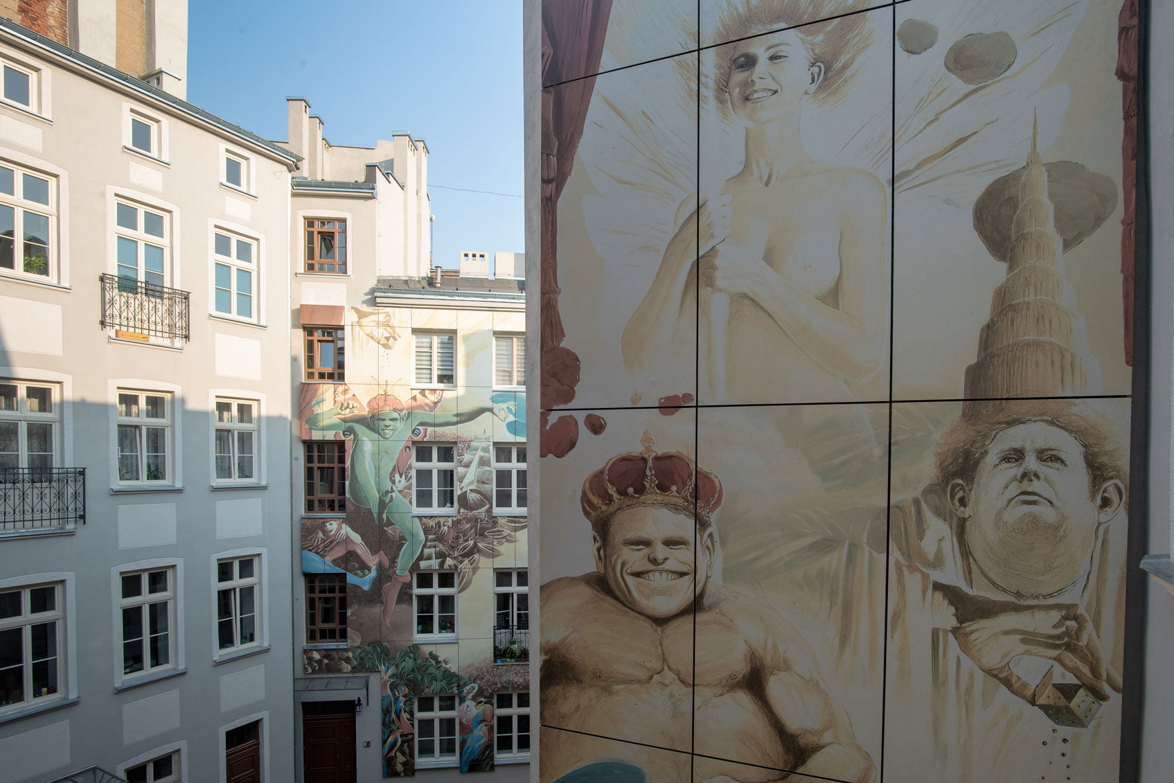 The Birth of the Day by Wojciech Siudmak integrated into a townhouse elevation